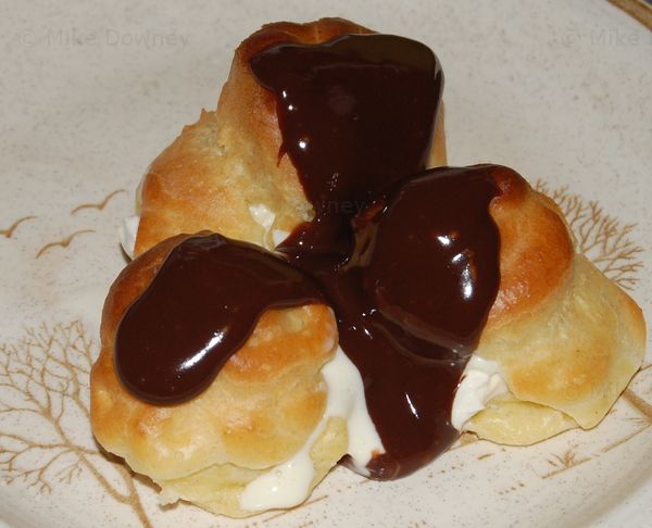 Cream and chocolate profiteroles